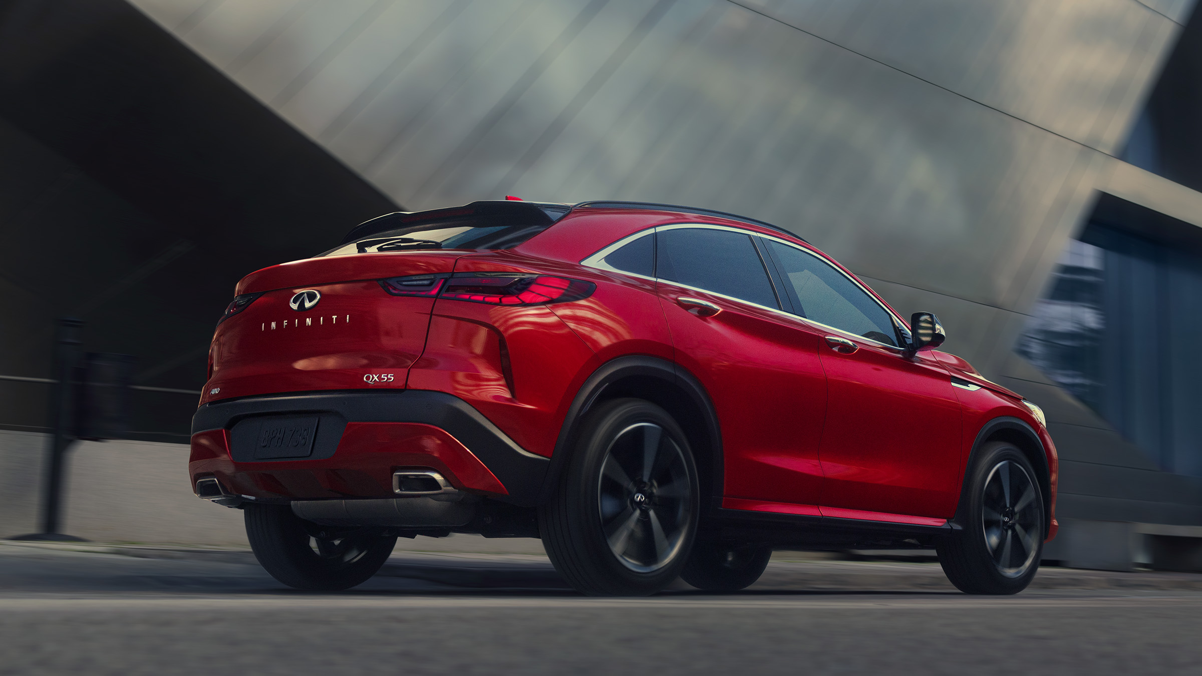 2022 INFINITI QX55 crossover coupe in red full body.